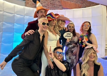 Guests at a wedding in Nottingham using the LED Inflatable Photo Booth